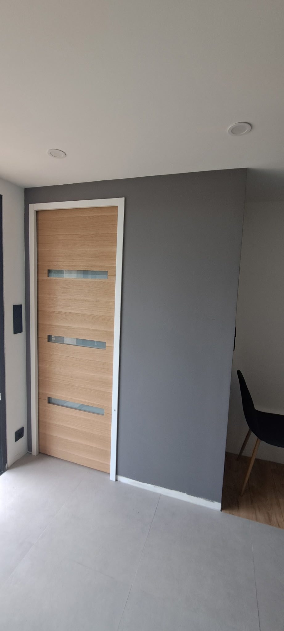 L'entrée et la porte du studio